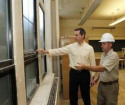Dalton McGuinty (left) is showed how the school is being greened
